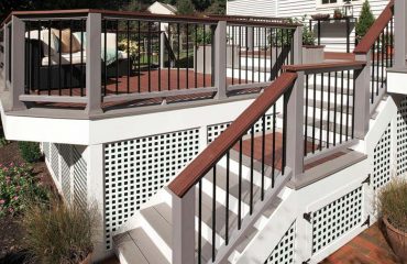 Brown deck with white accents, built with Trex decking material